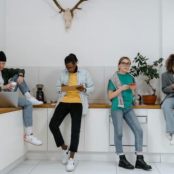 Group of diverse people sitting in a relaxed circle.